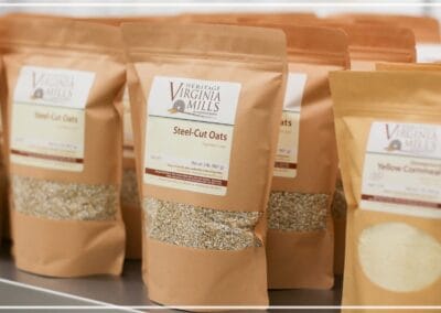 Bagged oats and cornmeal available for purchase from Virginia Heritage Mills.