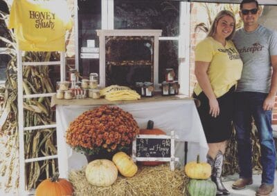 The owners of Hive and Honey, LLC set up at the Harvest Moon Festival in Gate City, Virginia.