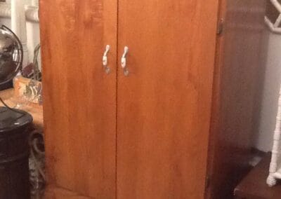 A handcrafted wooden wardrobe closet at R & J's Emporium & Woodworking